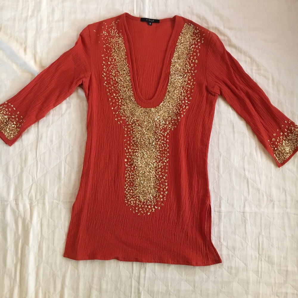burnt-orange stretchy tunic with gold sequins